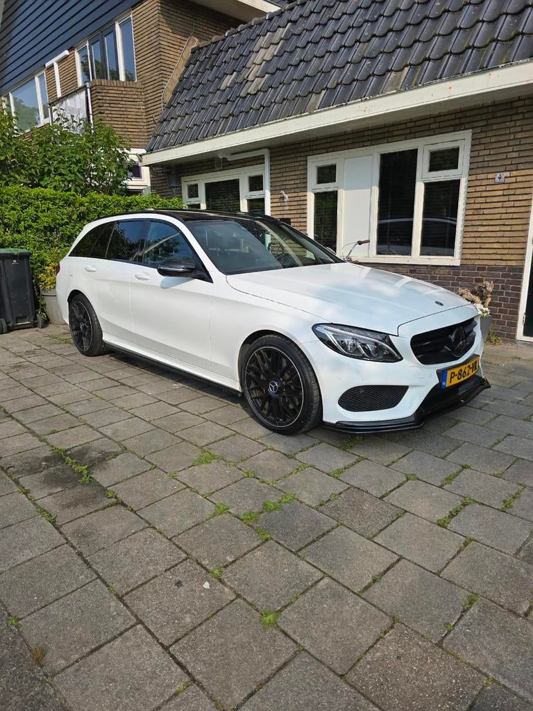 Mercedes-Benz C-Klasse C400  4MATIC 2017, Auto's, 1800 kg, Zwart, Leder, Stationwagon