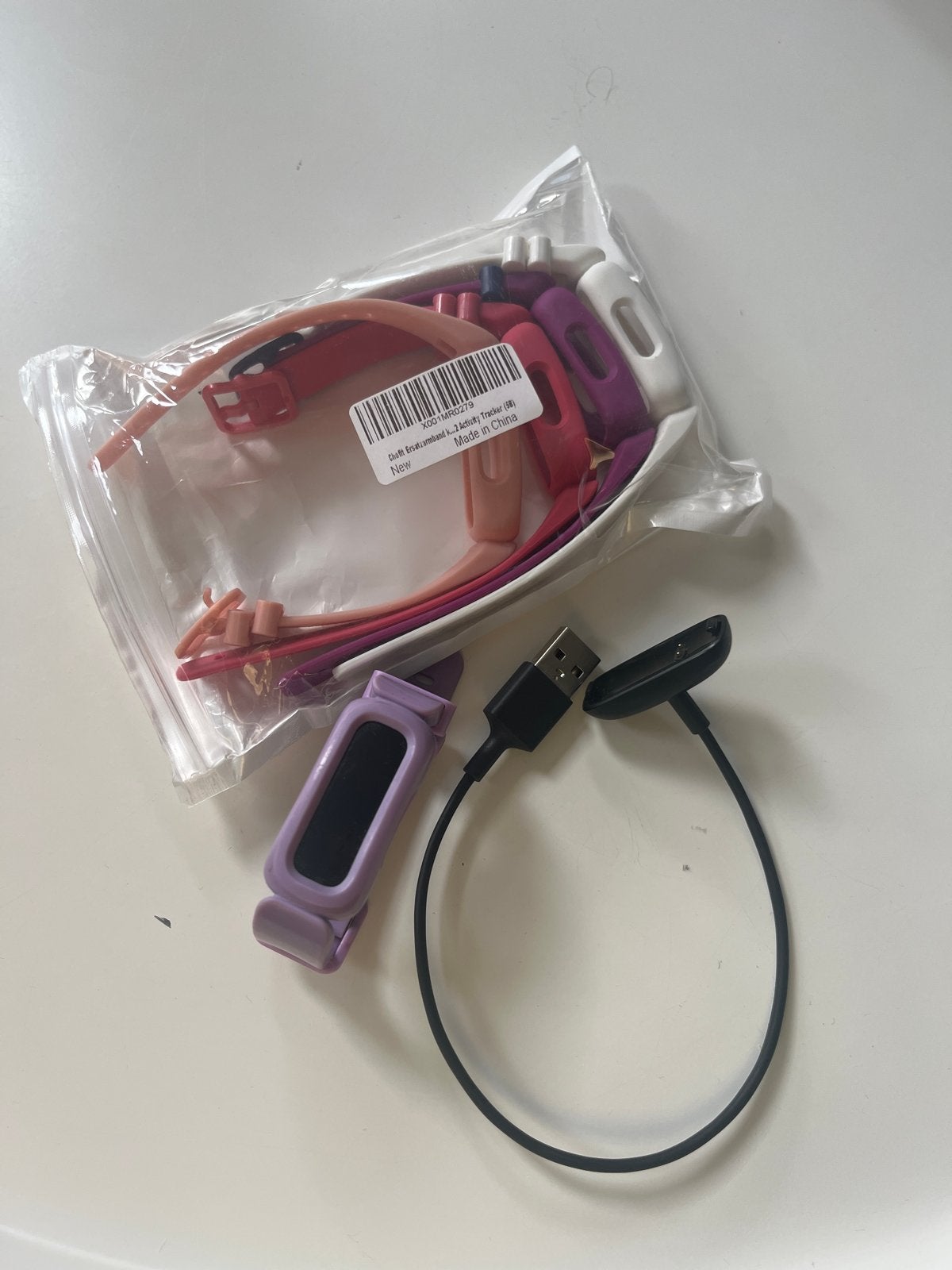 Fitbit Ace 3 Kids Activity Tracker met extra bandjes, Gebruikt, Paars, Ophalen of Verzenden, Waterdicht