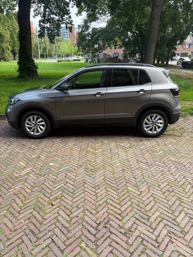 Volkswagen T-Cross 1.0 TSI 95pk 2021 Grijs, Auto's, Voorwielaandrijving, Dealer onderhouden, 95 pk, Origineel Nederlands