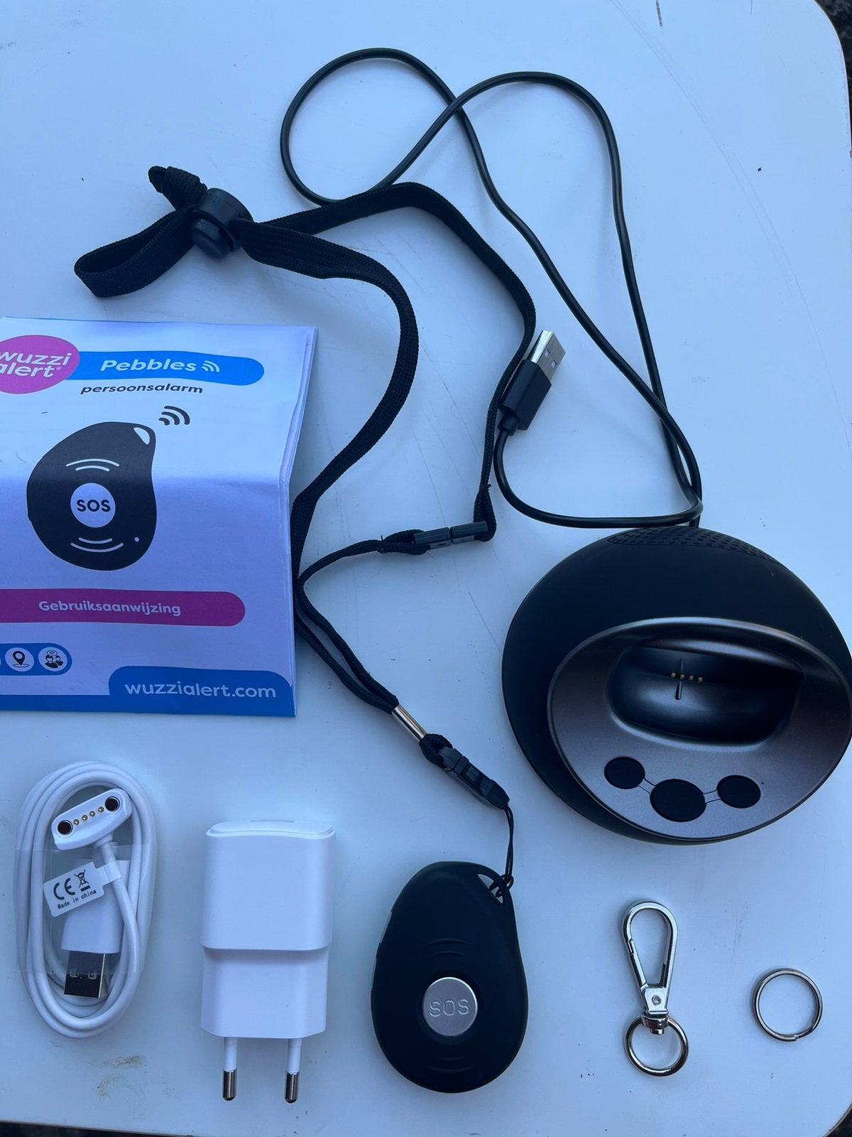 Wuzzi Pebbles persoonsalarm type EV-07B, Diversen, Verpleegmiddelen, Ophalen of Verzenden, Zo goed als nieuw