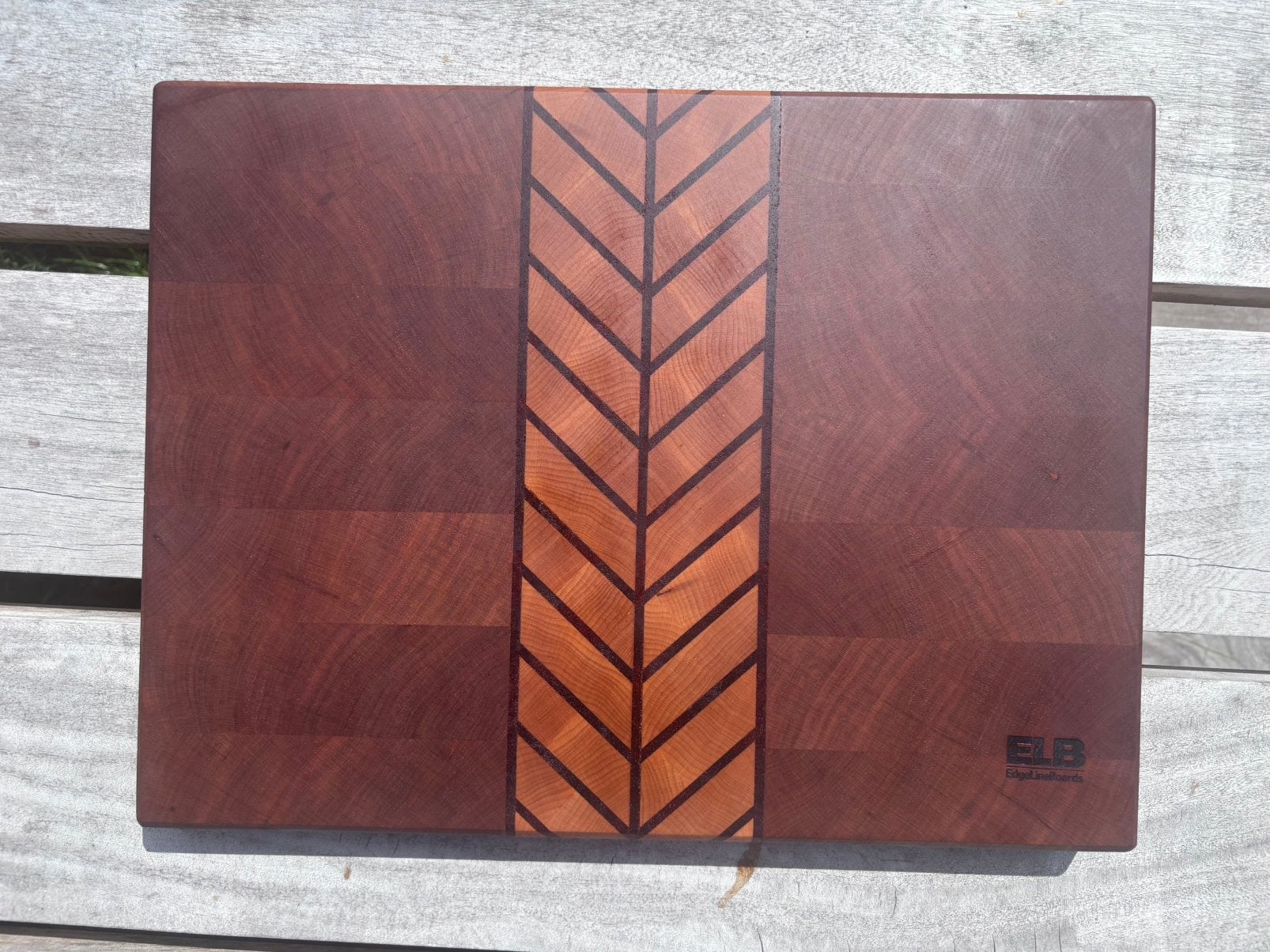 Handgemaakte end‑grain snijplank – kers • padouk • esdoorn, Snij-/serveerplank, Ophalen of Verzenden, Nieuw, Hout
