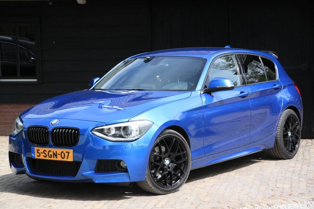 BMW 1-Serie 118I 125KW 5DR 2012 Blauw, Auto's, BMW, 1-Serie, Achterwielaandrijving, Zwart, 4 cilinders