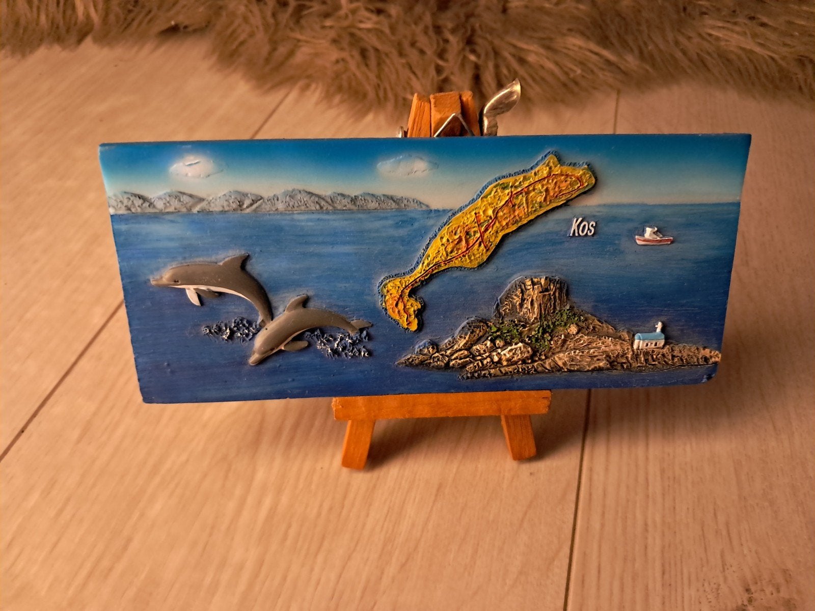 Schilderijtje Kos Griekenland met dolfijnen en ezel, Meerkleurig, Overige materialen, Overige stijlen, Ophalen of Verzenden