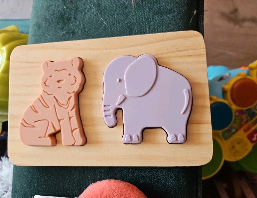 Houten puzzel met silicone dierenfiguren, Ophalen of Verzenden, Zo goed als nieuw, Overige typen