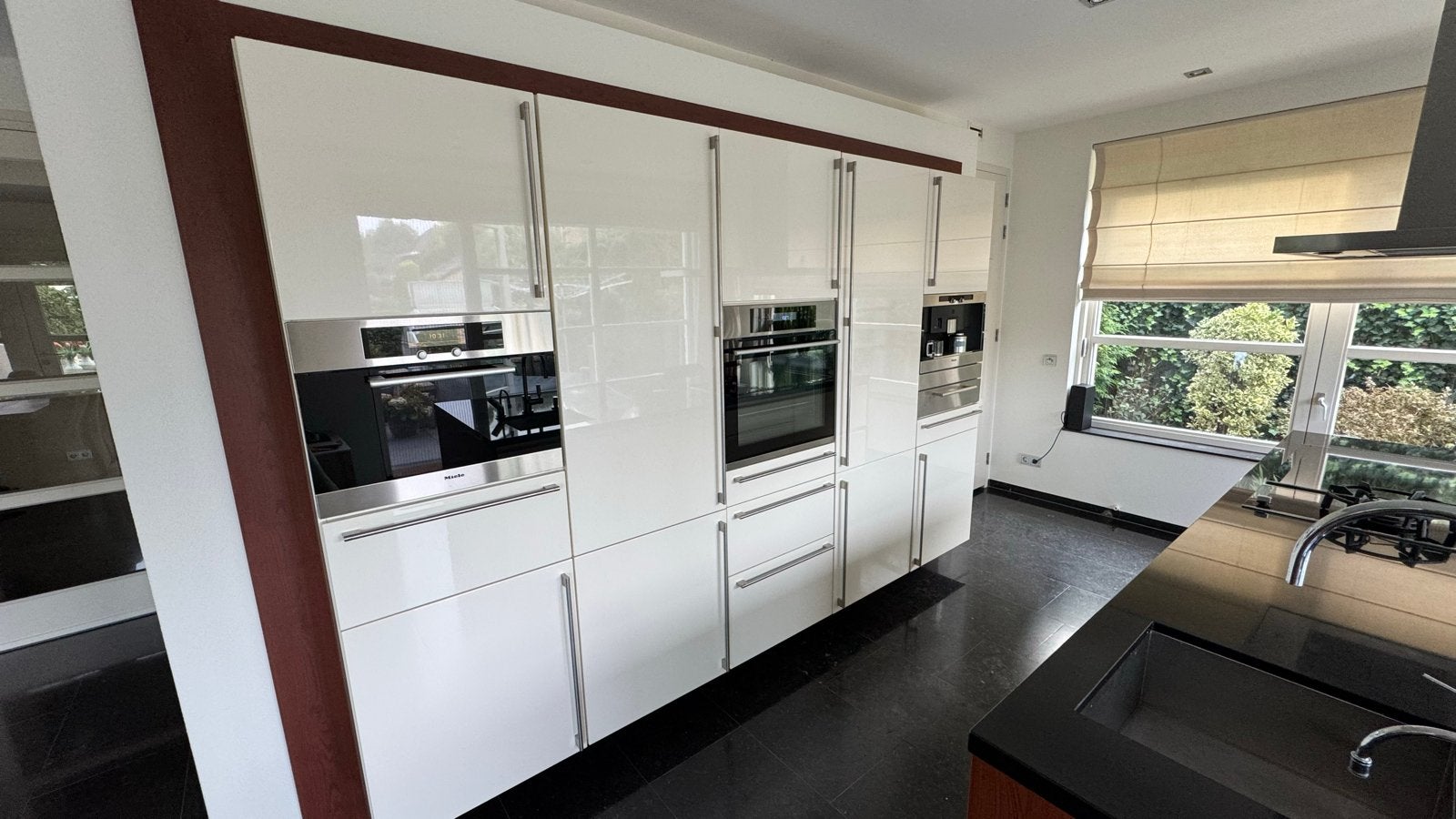 Foto 8 van Siematic Keuken met Eiland en Zwart Granieten Blad