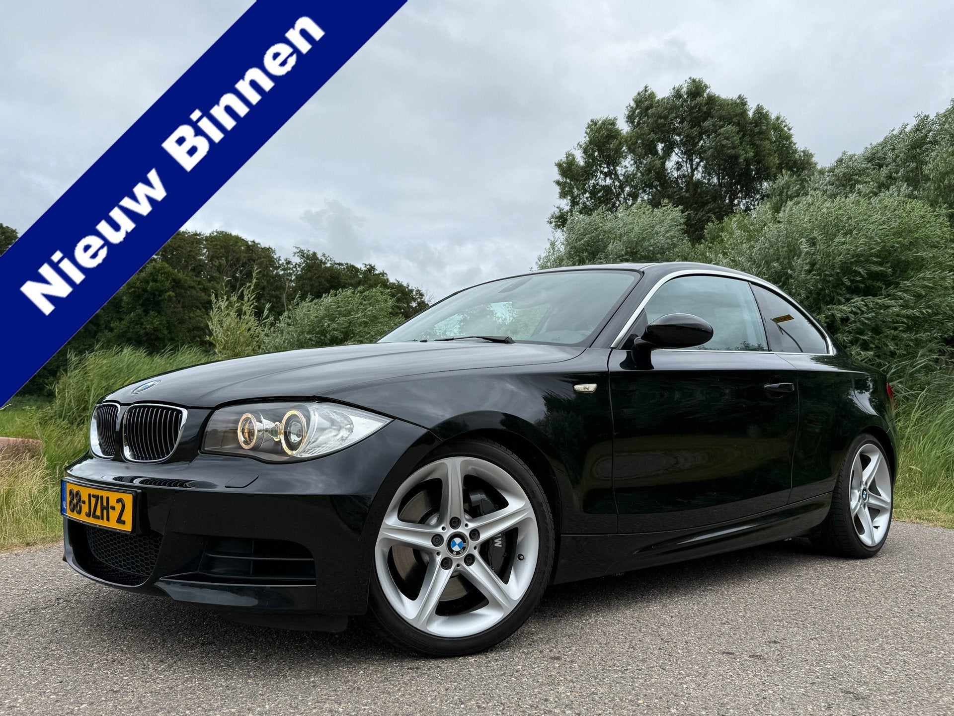 BMW 1-serie Coupé 135i High Executive | Origineel NL | Hand, Auto's, BMW, 1-Serie, Dealer onderhouden, Achterwielaandrijving, Gebruikt