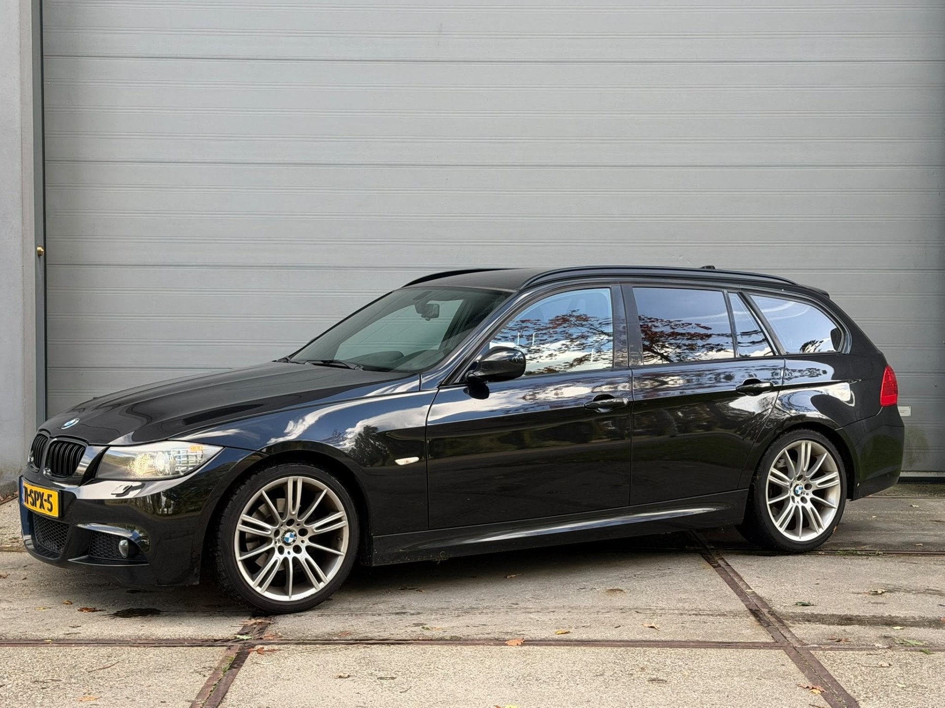 BMW 3 Serie Touring 318i Corporate Lease M Sport Edition, Euro 5, Zwart, 4 cilinders, Alcantara