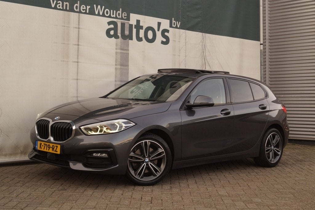 BMW 1-serie 118i 136pk Automaat High Executive -PANO-NAVI-EC, Auto's, Dealer onderhouden, 136 pk, Gebruikt, Automatische klimaatregeling
