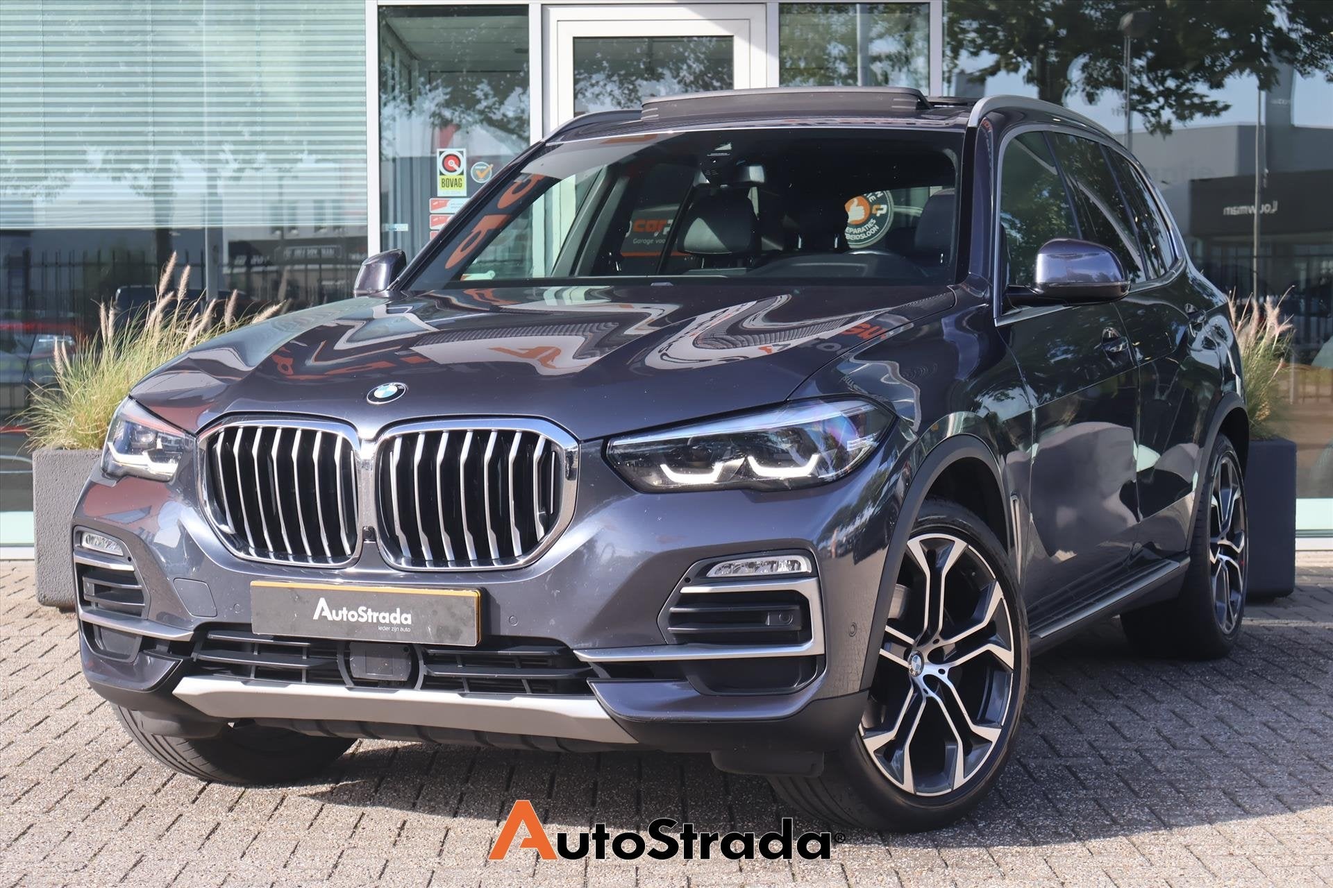 BMW X5 (g05) xDrive40i High Executive 340pk | Camera | Cruis, Dealer onderhouden, Gebruikt, Met garantie (alle), 138 €/maand