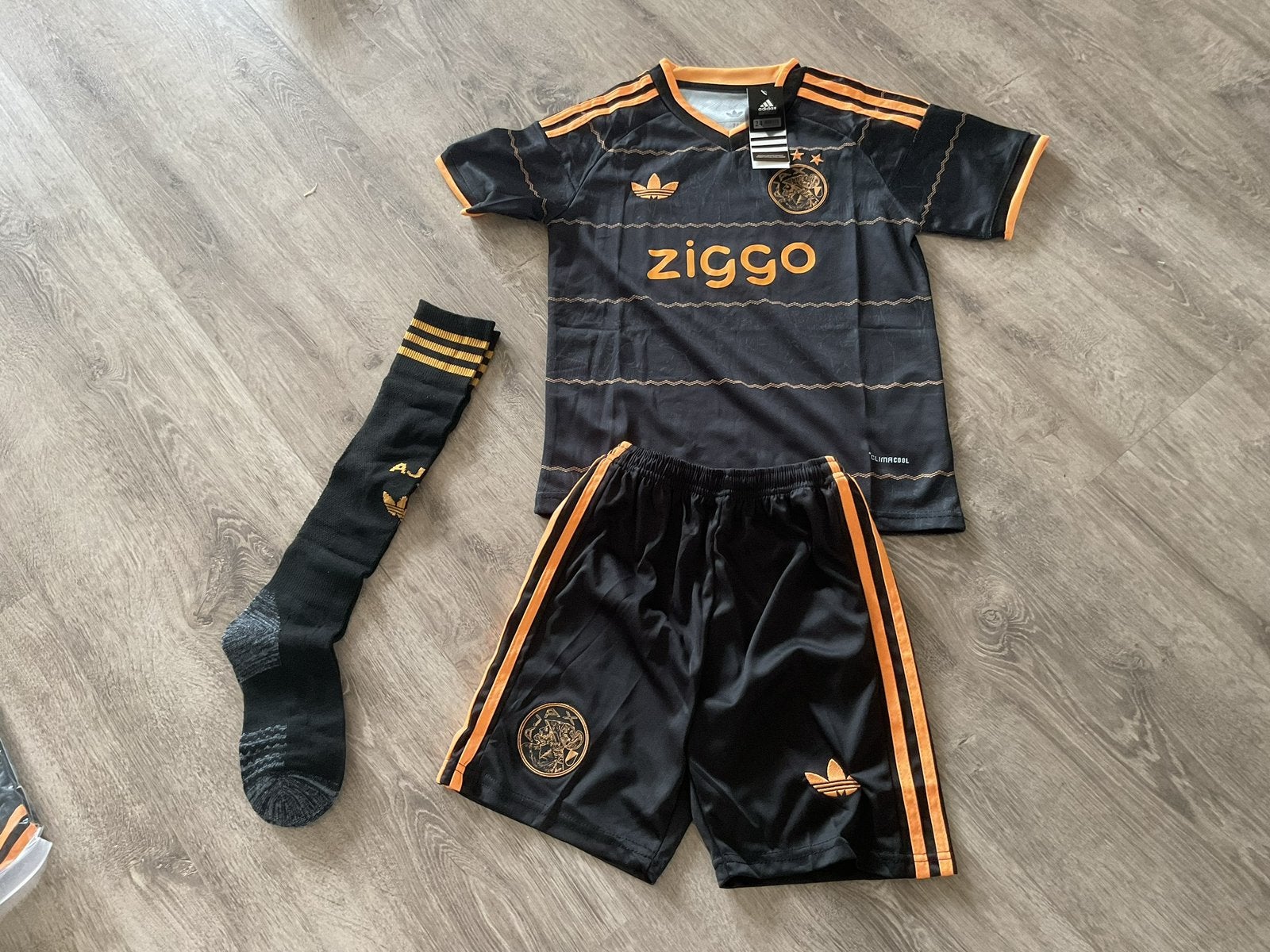 Ajax tenue zwart kindermaten, Maat XS of kleiner, Ophalen of Verzenden, Nieuw, Shirt