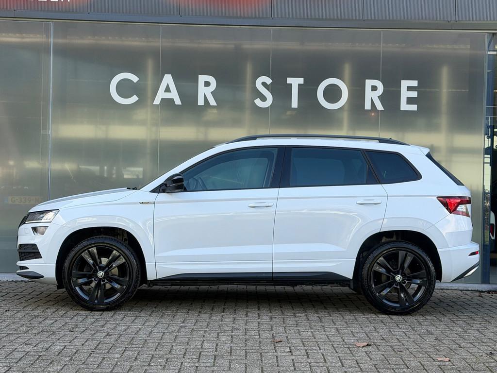 Skoda Karoq 1.5 TSI DSG 150PK Sportline Stoelverwarming, Stof, 4 cilinders, 150 pk, Wit
