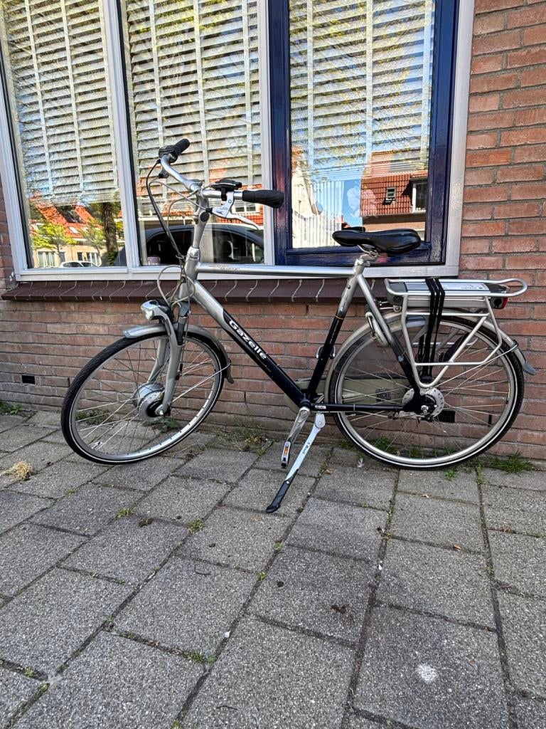 Gazelle Orange elektrische herenfiets, framehoogte 61, Fietsen en Brommers, Elektrische fietsen, Ophalen, Minder dan 30 km per accu