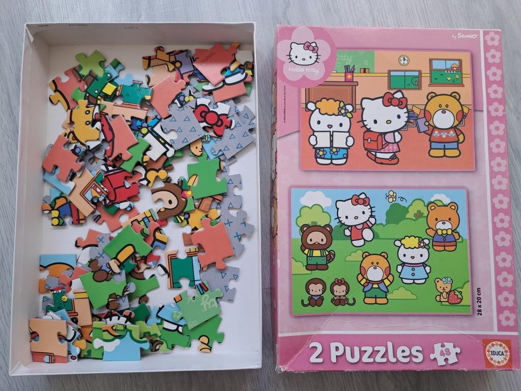 2 Hello Kitty puzzles in doos, Ophalen of Verzenden, 10 tot 50 stukjes, Gebruikt
