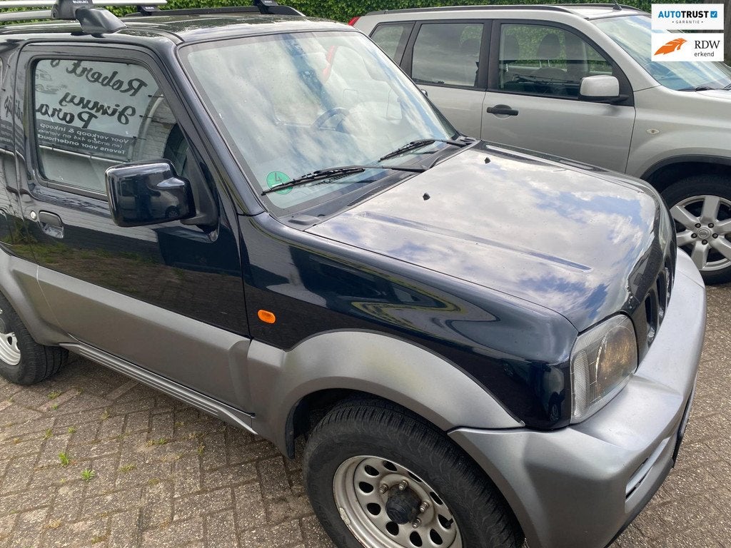 Suzuki Jimny 1.3 two-tone, zwart/grijs NU IN DE AANBIEDING !, Auto's, Suzuki, Euro 5, 4 stoelen, Zwart, 14 km/l