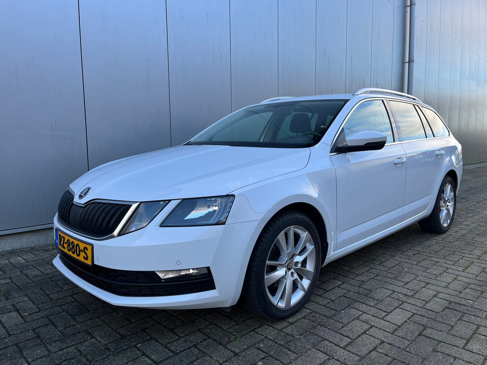 Skoda Octavia 1.6 TDI Greentech 115pk Dsg-7 2017 Wit, Auto's, Stof, 4 cilinders, Wit, Stationwagon