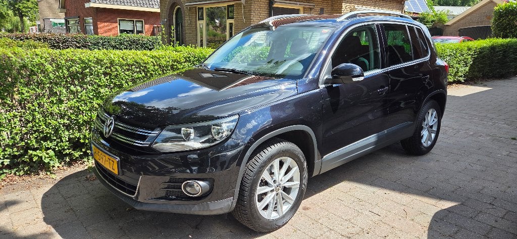 Volkswagen Tiguan 1.4 TSI 90KW BMT 2011 Zwart, Auto's, Voorwielaandrijving, Euro 5, Zwart, 4 cilinders