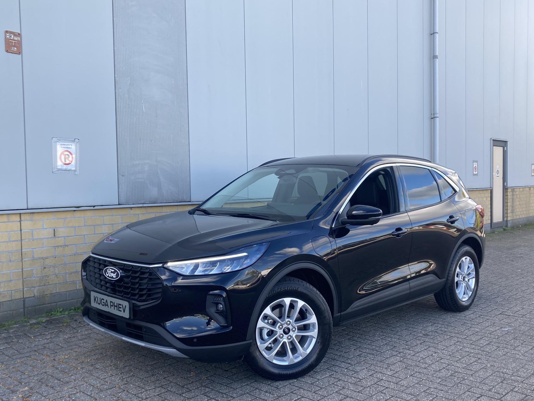 Ford Kuga 2.5 PHEV Titanium Driver Assistance Pack - Reserve, Euro 6, 4 cilinders, Verwarmde buitenspiegels, Zwart