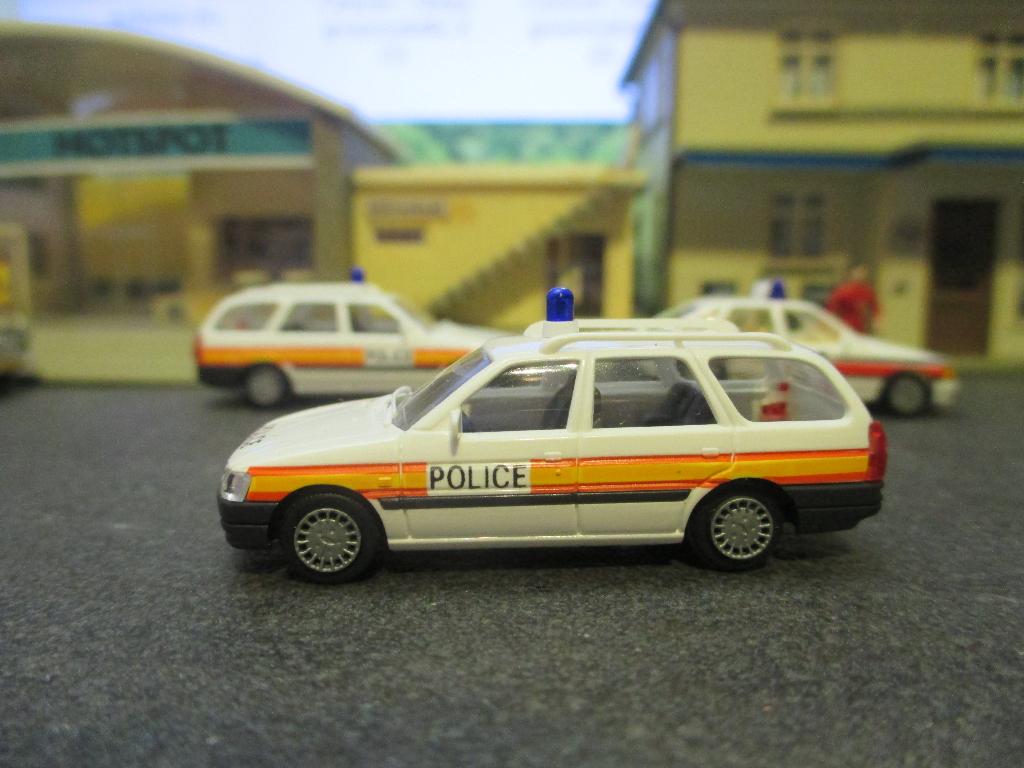 Ford Escort Mk.5 Estate - Rietze POLICE ( Politie ) U.K., Ophalen of Verzenden, Zo goed als nieuw, Auto, Rietze
