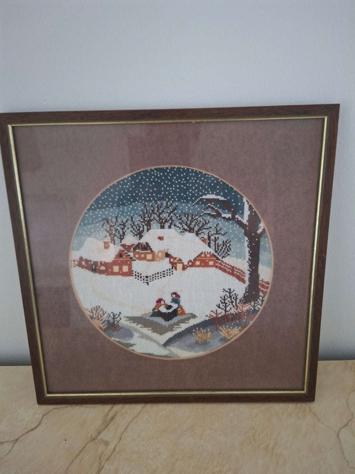Geborduurde schilderij, Ophalen