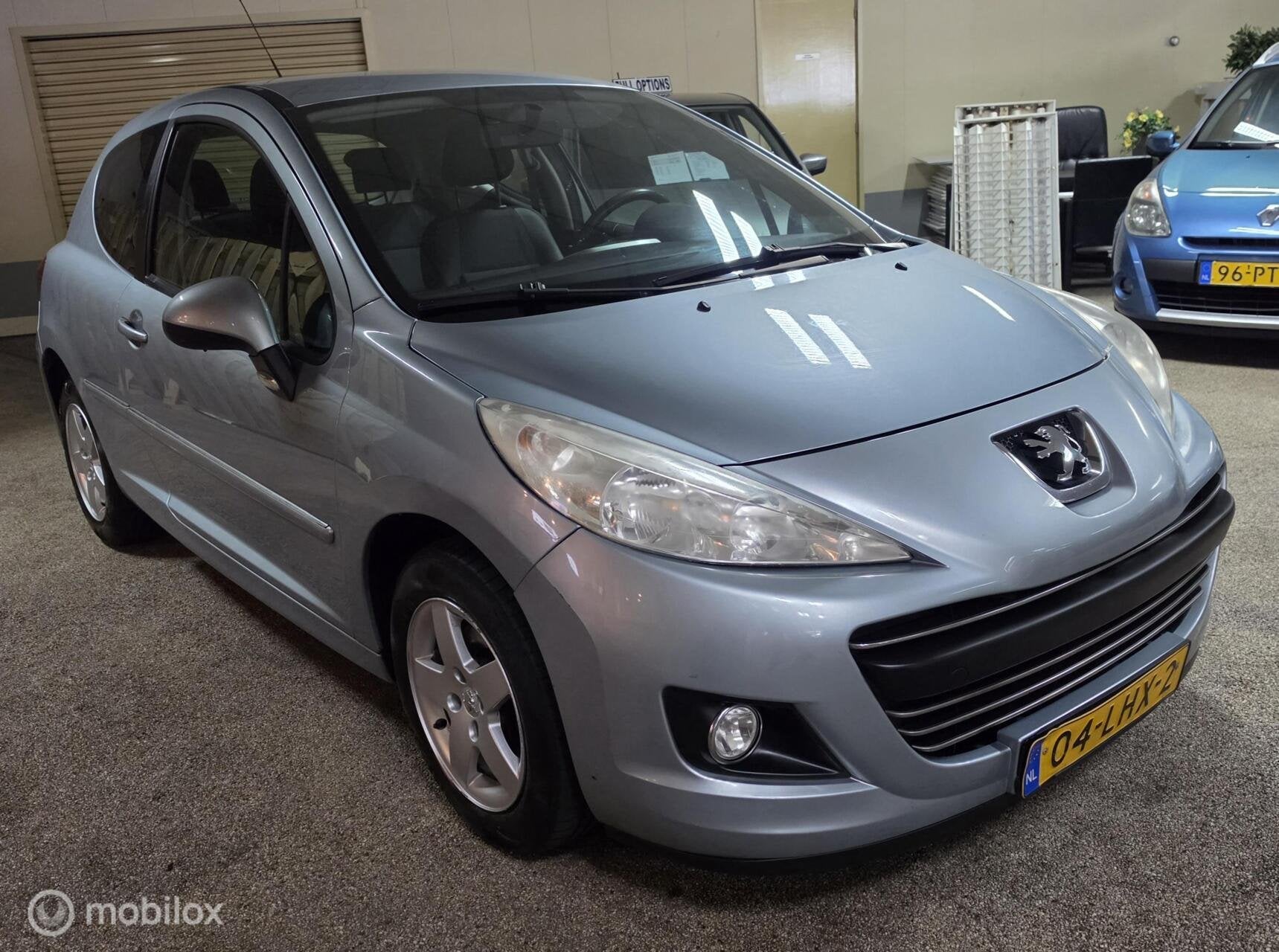Peugeot 207 1.4 VTi Style, Auto's, Voorwielaandrijving, Euro 5, Blauw, 49 €/maand