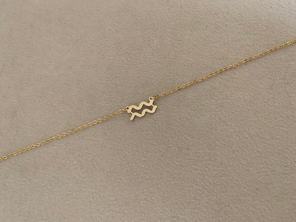 Gouden ketting met sterrenbeeld bedel waterman waterproof, Nieuw, Ophalen of Verzenden, Goud, Overige materialen