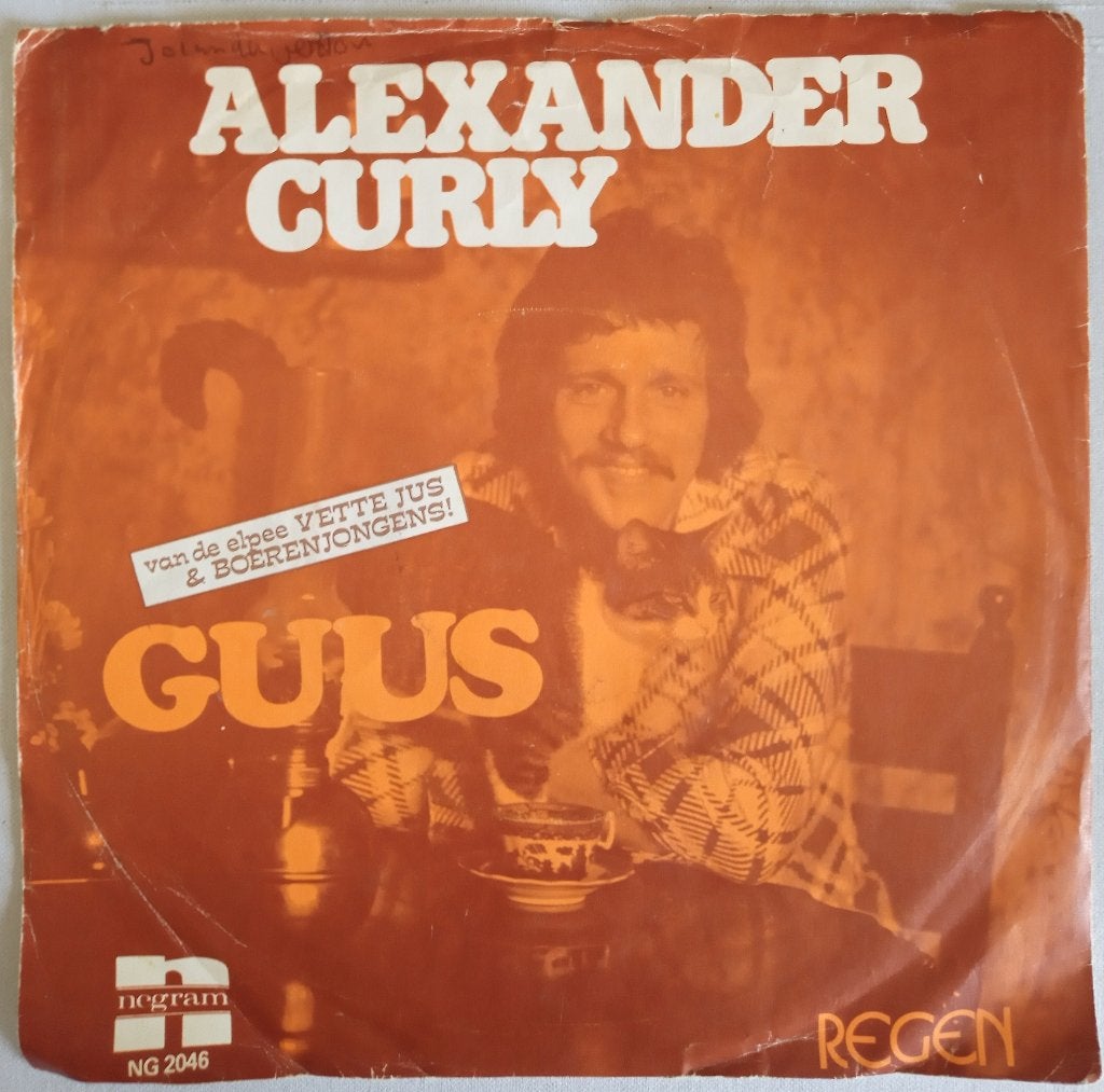 Alexander Curly - Guus. VG++, Fotohoes, Ophalen of Verzenden, Gebruikt, Nederlandstalig