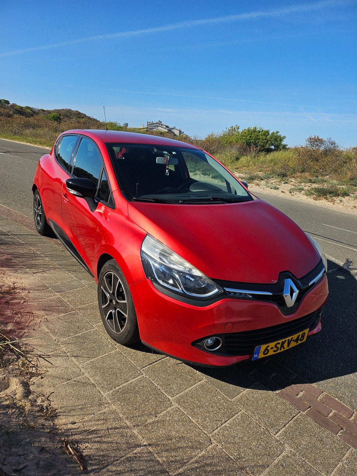 Renault Clio 0.9 TCE 66KW 5-DRS 2013 Rood, Auto's, Voorwielaandrijving, 898 cc, 40 €/maand, 540 kg