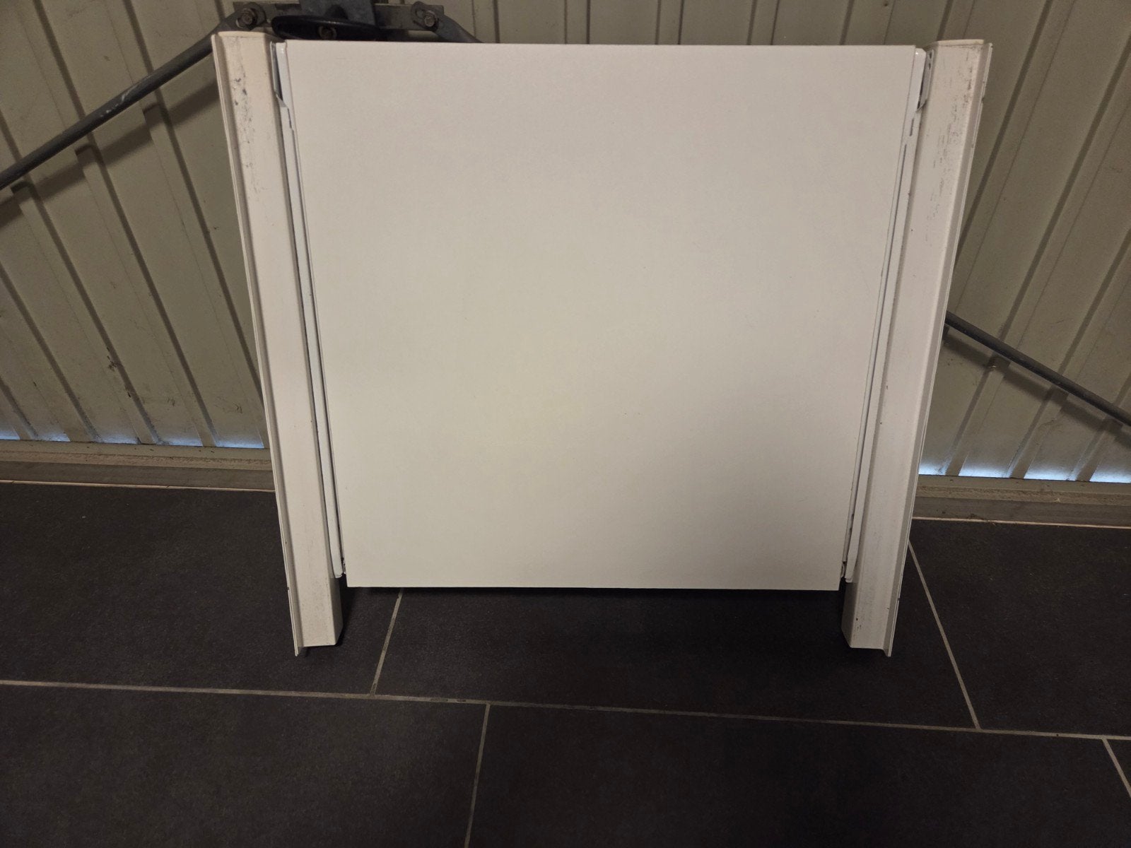 Uitschuifbaar plateau voor wasmachine/droger, Ophalen