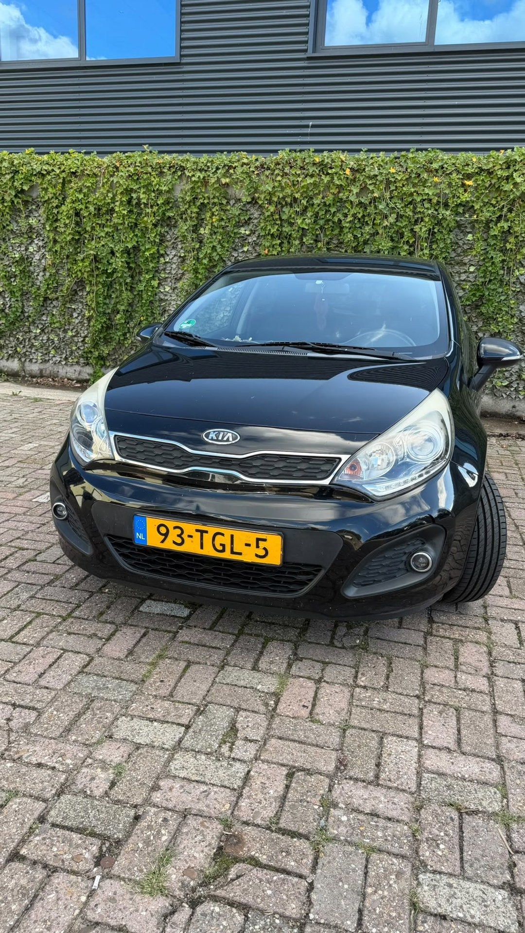 Kia Rio 1.2 CVVT Plus Pack, Auto's, Euro 5, 4 cilinders, Zwart, Origineel Nederlands