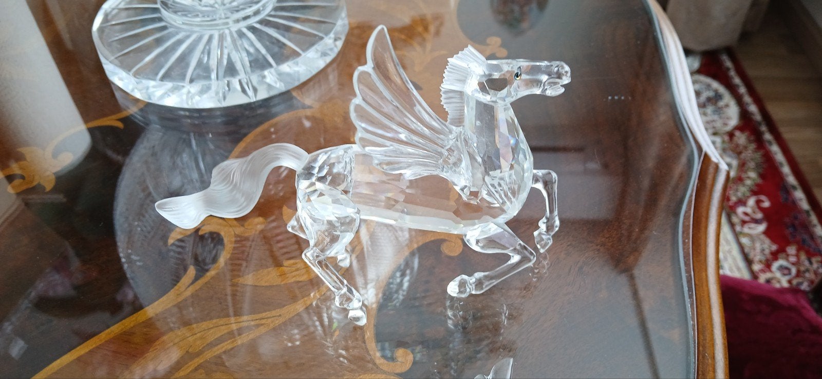 Swarovski  vliegendpaard beschadigd., Ophalen of Verzenden, Zo goed als nieuw, Figuurtje