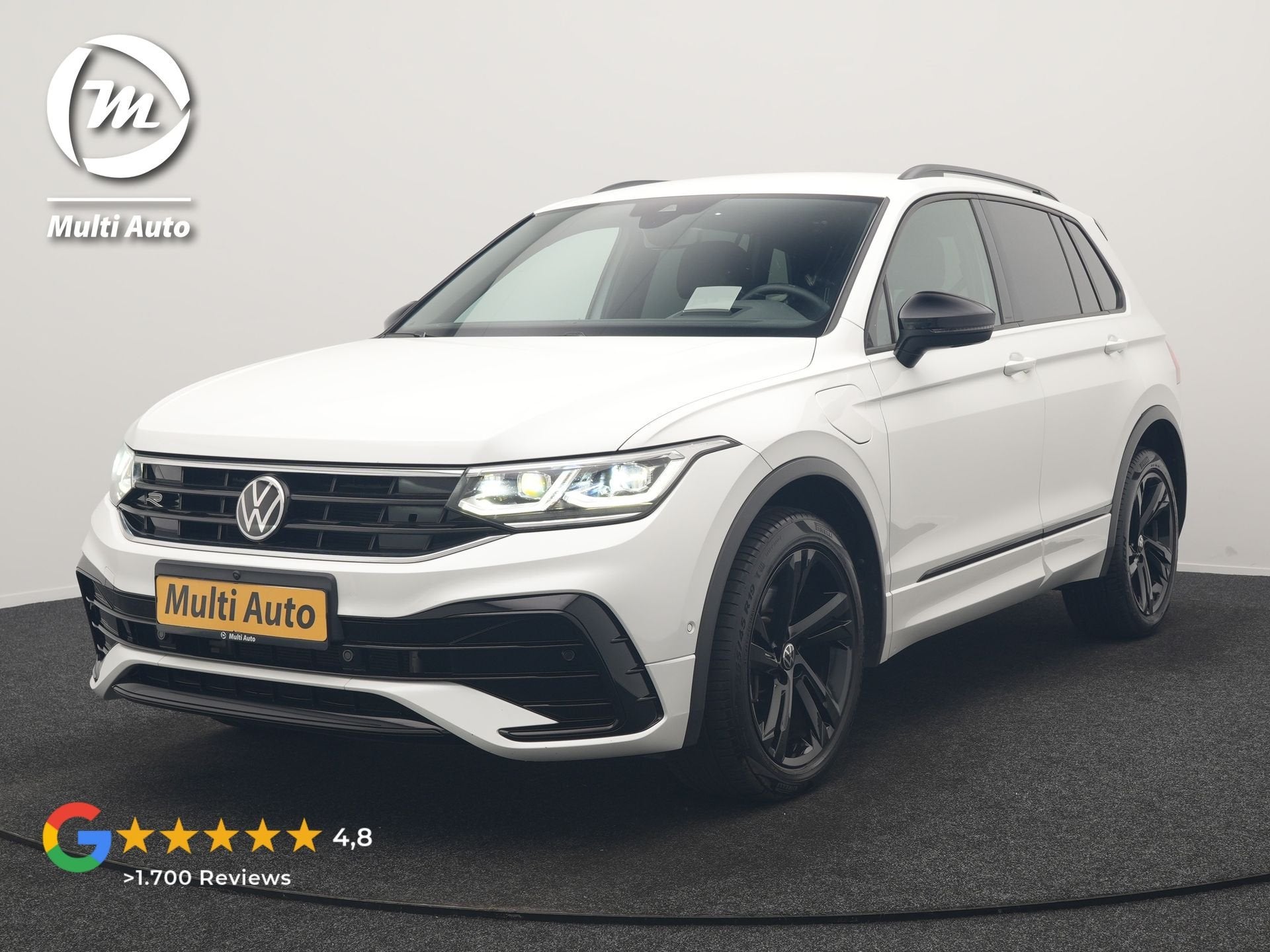 Volkswagen Tiguan 1.4 TSI eHybrid R-Line PHEV 245pk Dealer O, Auto's, Zwart, 4 cilinders, Alcantara, Hybride Elektrisch/Benzine