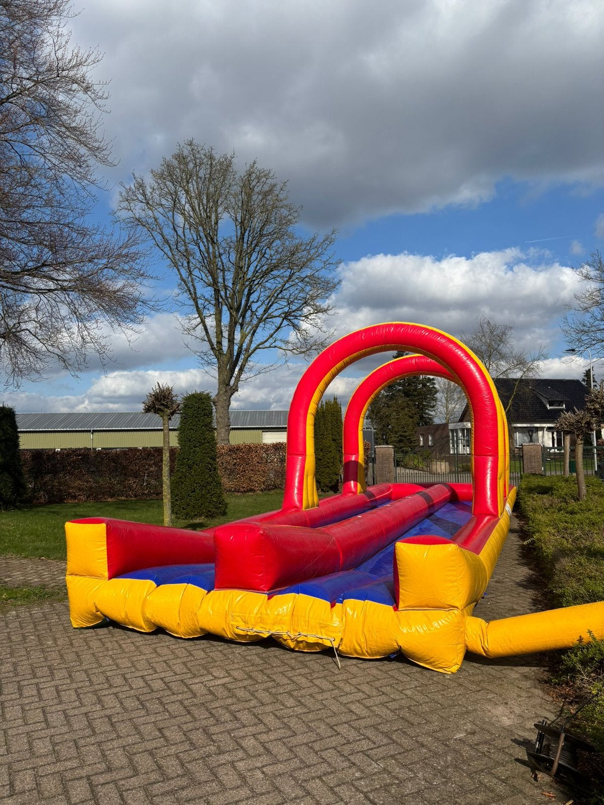 Springkussen waterglijbaan 10 meter voor groot en klein, Kinderen en Baby's, Ophalen of Verzenden, Zo goed als nieuw