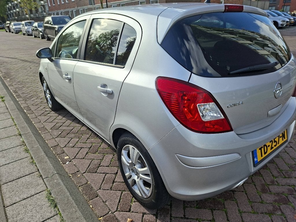 Opel Corsa 1.4 16V 5D AUT 2011 Grijs, Auto's, Automaat, Isofix, Stof, 1398 cc
