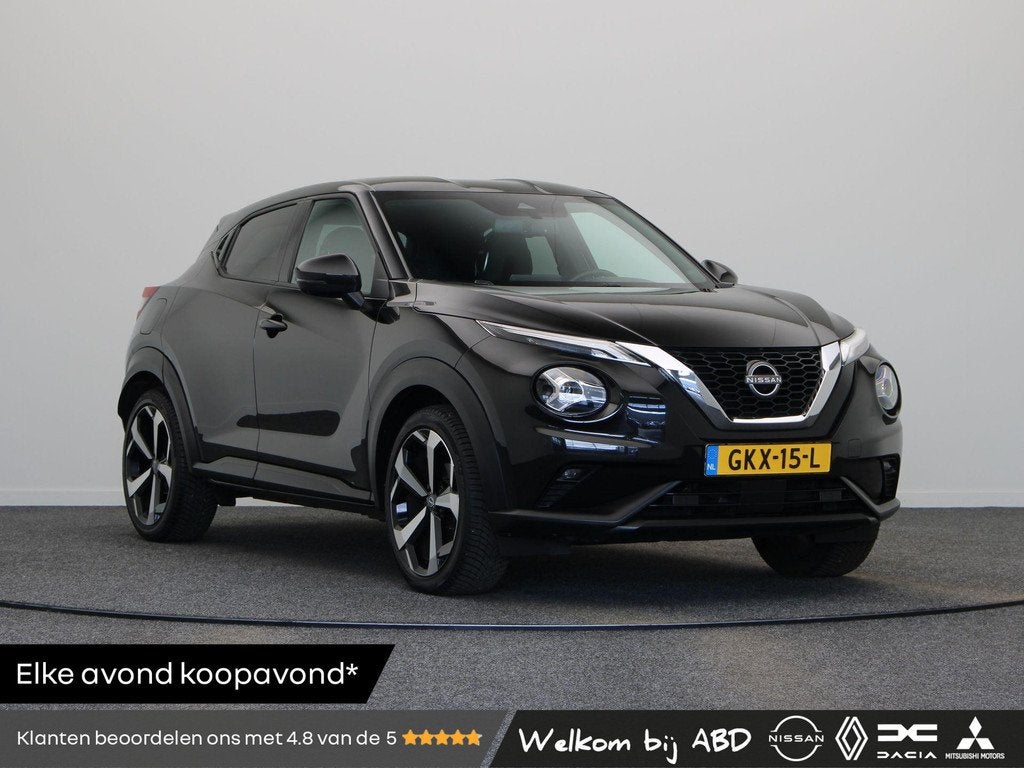 Nissan Juke 1.0 DIG-T Tekna | Leer | Trekhaak | Bose audio |, Auto's, Nissan, Euro 6, Leder en Stof, Zwart, Bedrijf