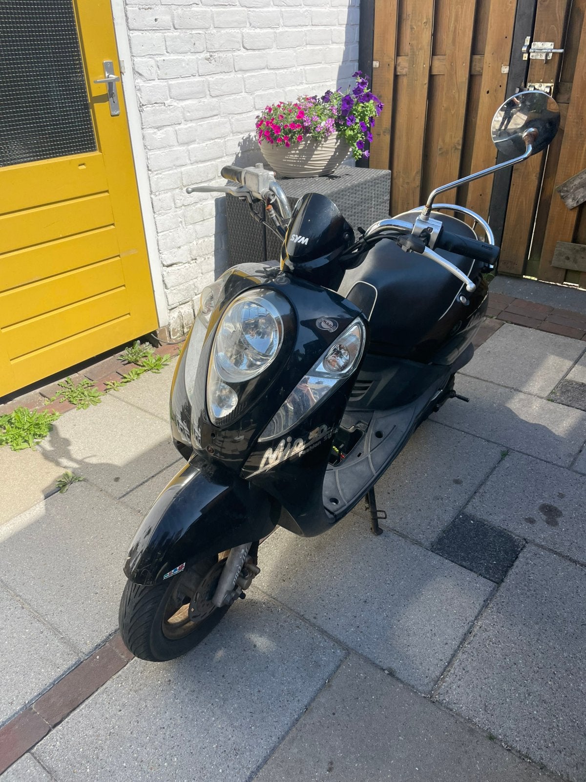 Sym mio zonder 123, Fietsen en Brommers, Ophalen, Zo goed als nieuw, Benzine, Mio