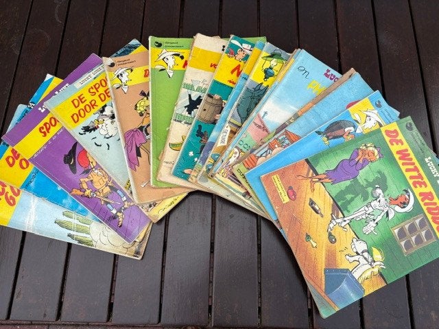 Lucky Luke - 15 gelezen stripboeken, Meerdere stripboeken, Ophalen of Verzenden, Gelezen