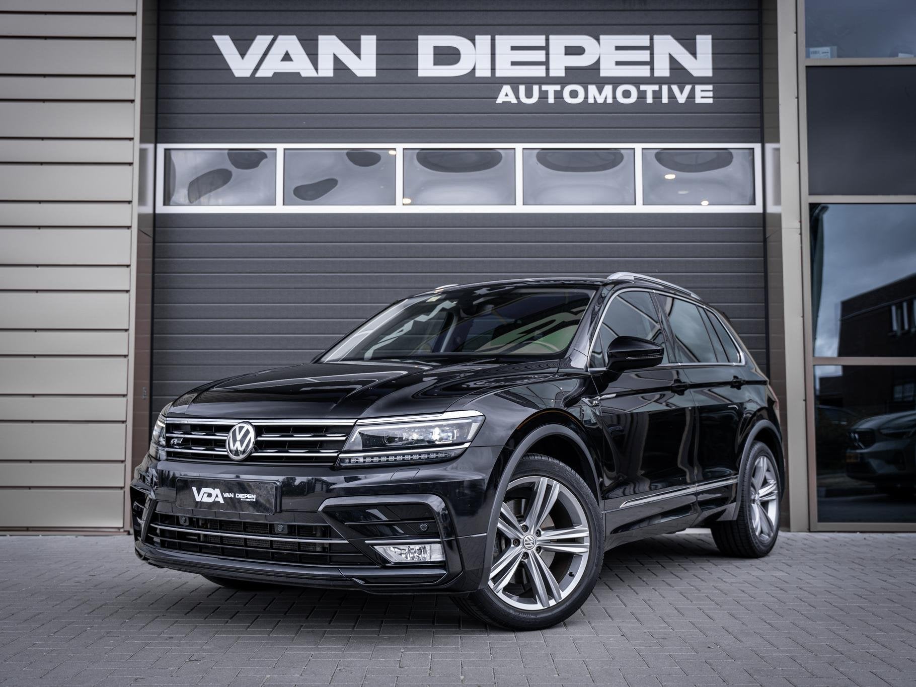 Volkswagen Tiguan 2.0 TSI 4Motion Highline, Auto's, Automaat, Stof, Gebruikt, 4 cilinders