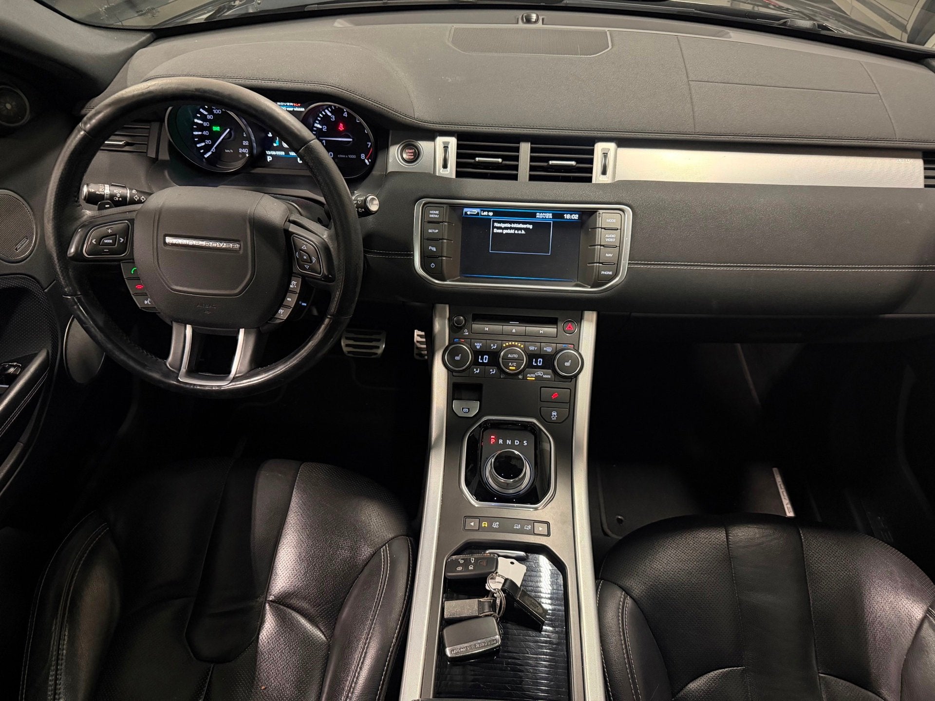 Land Rover Range Rover Evoque 2.0 Si 4WD Prestige / Leder /, Auto's, Automaat, Euro 5, 4 cilinders, Met garantie (alle)