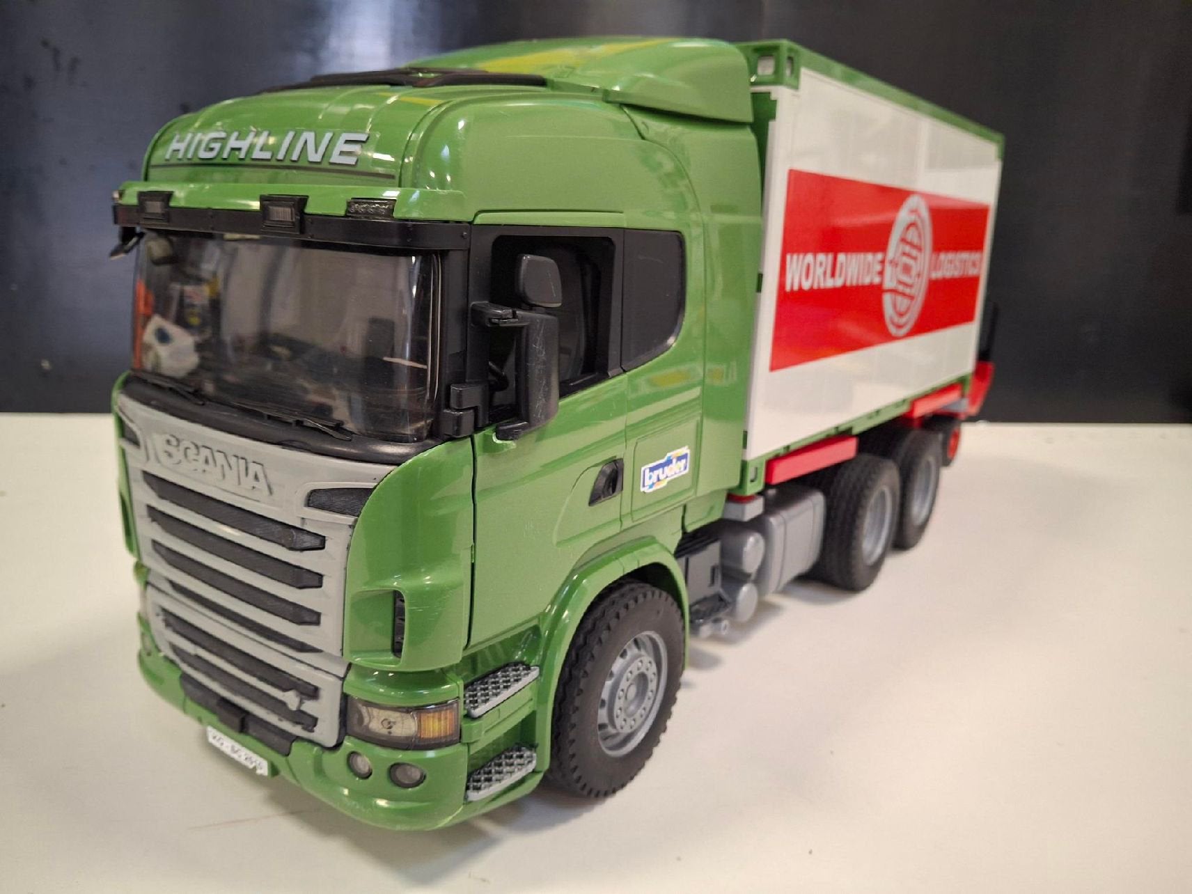 Bruder Scania R-Serie met WWL wissellaadbak en kooiaap, Ophalen of Verzenden, Gebruikt