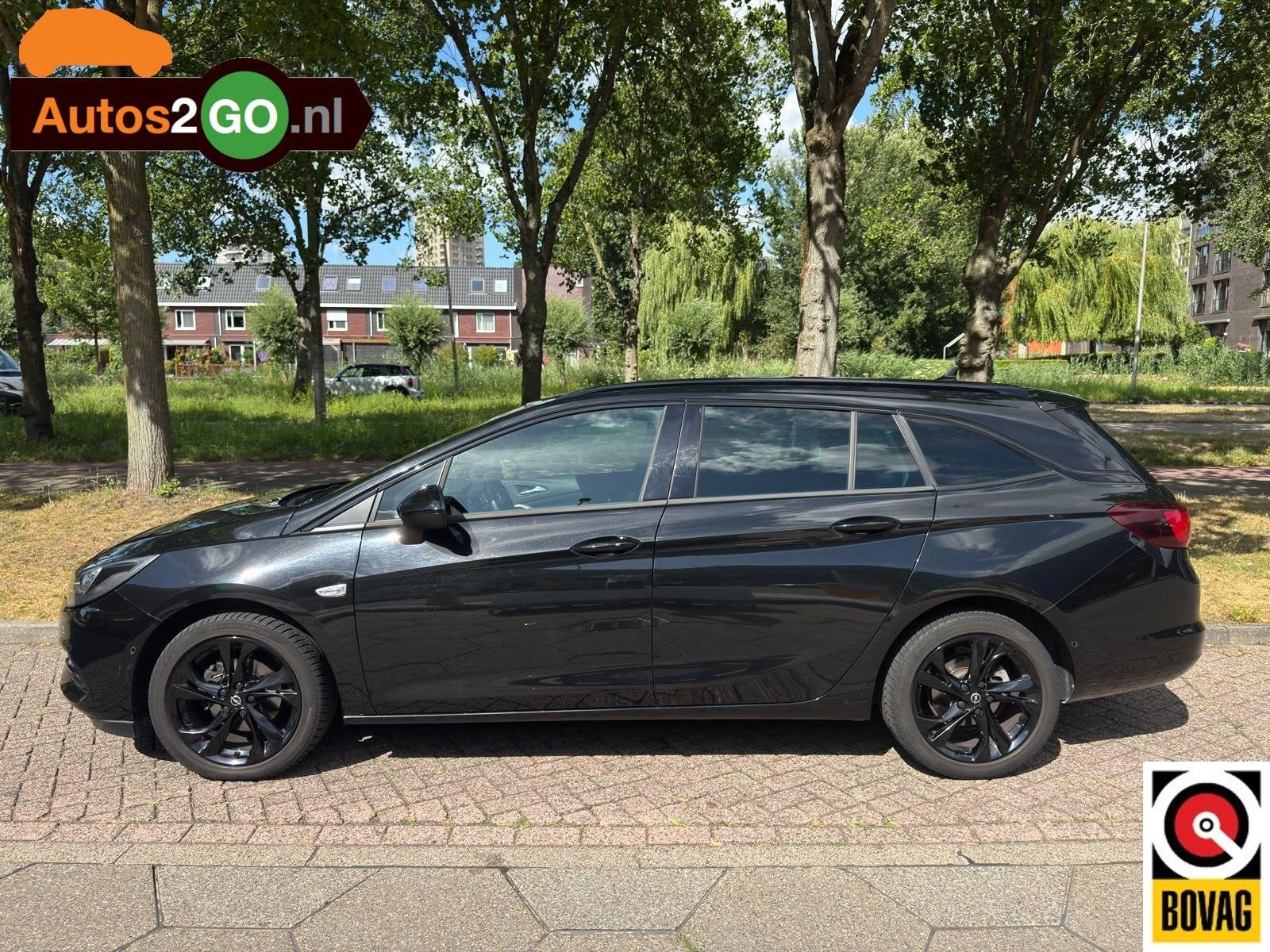 Opel Astra Sports Tourer 1.2 Business Elegance, Auto's, Voorwielaandrijving, Euro 6, 1199 cc, Zwart