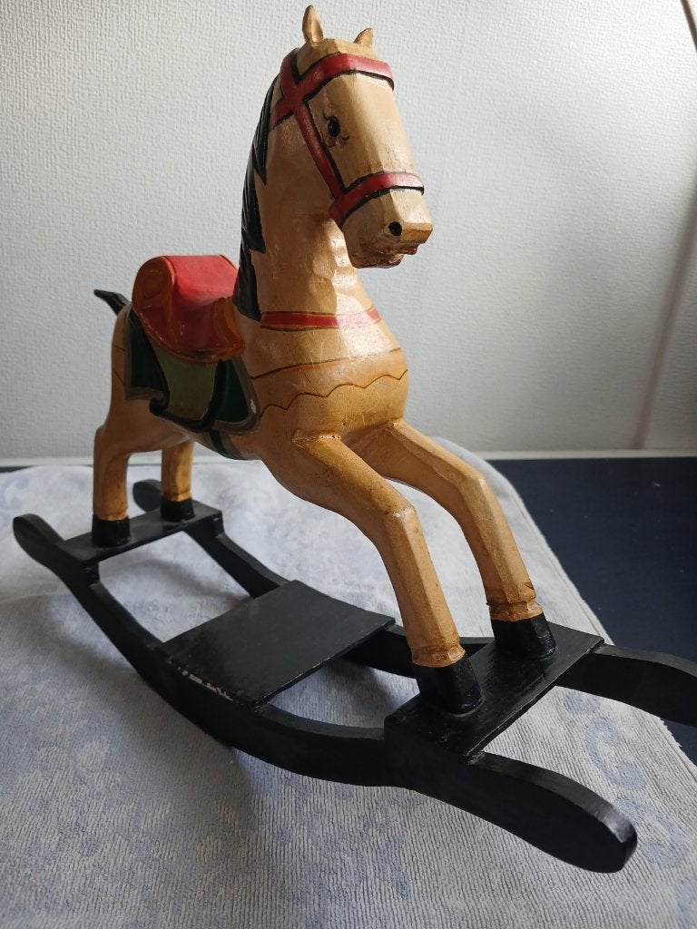 Antiek houten hobbelpaard, Ophalen