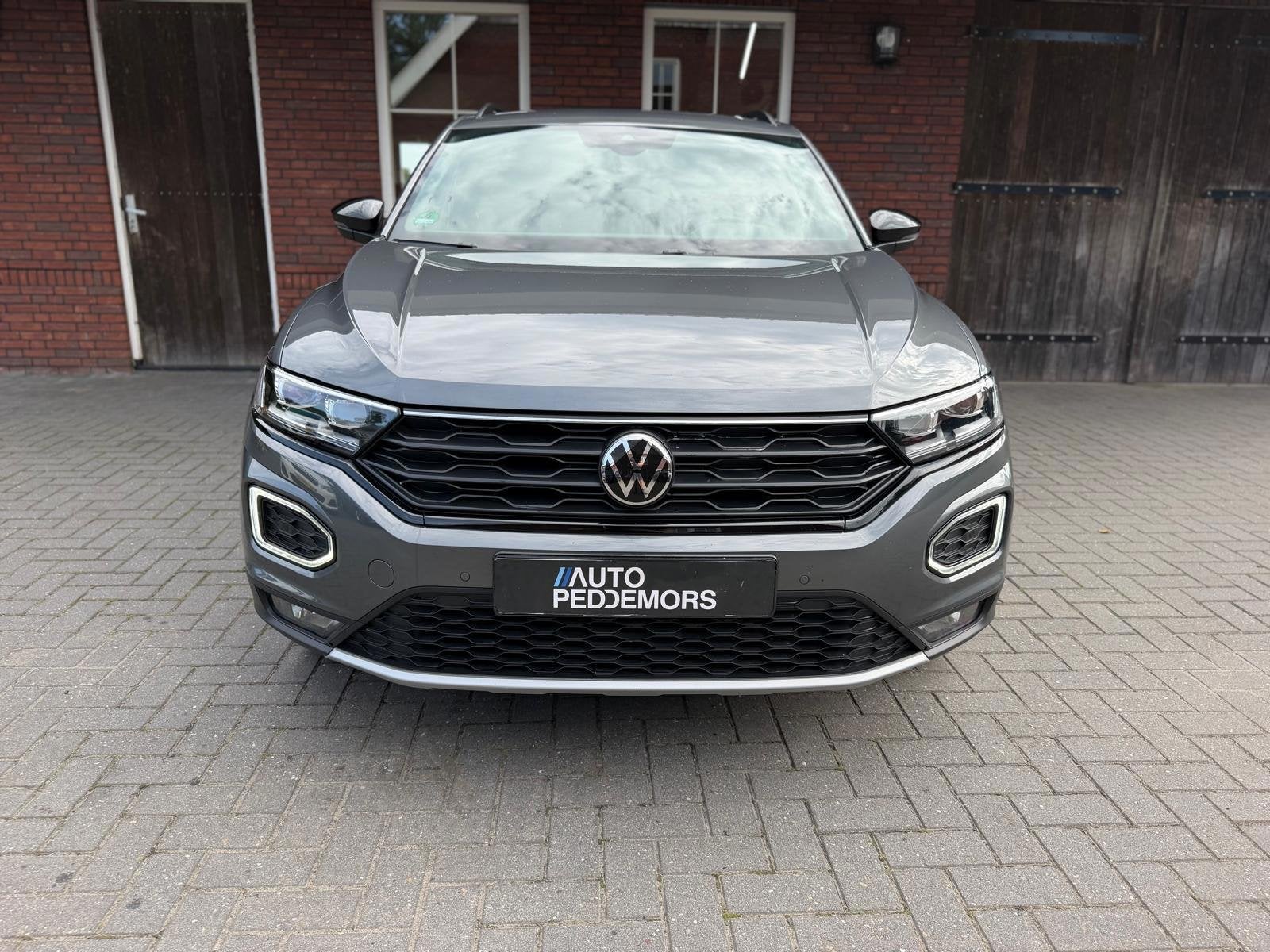 Volkswagen T-Roc 1.5 TSI Sport |Trekhaak| LED| ACC| Blindspo, Auto's, 4 cilinders, 150 pk, Leder en Stof, Bedrijf