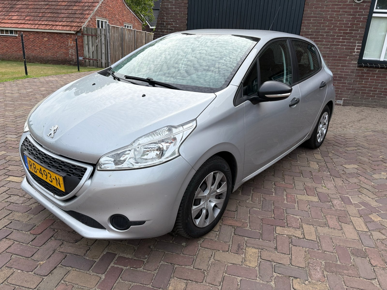 Peugeot 208 1.0 VTI 50KW/68PK 5-D 2014 Grijs, Auto's, Voorwielaandrijving, Parkeersensor, Particulier, 3 cilinders