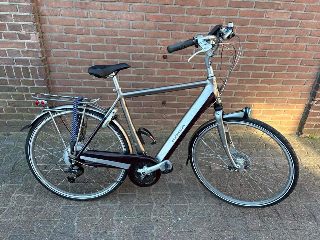 Te koop mooie Elektrische herenfiets koga tesla tour 57cm, Fietsen en Brommers, Elektrische fietsen, Overige merken, Minder dan 30 km per accu
