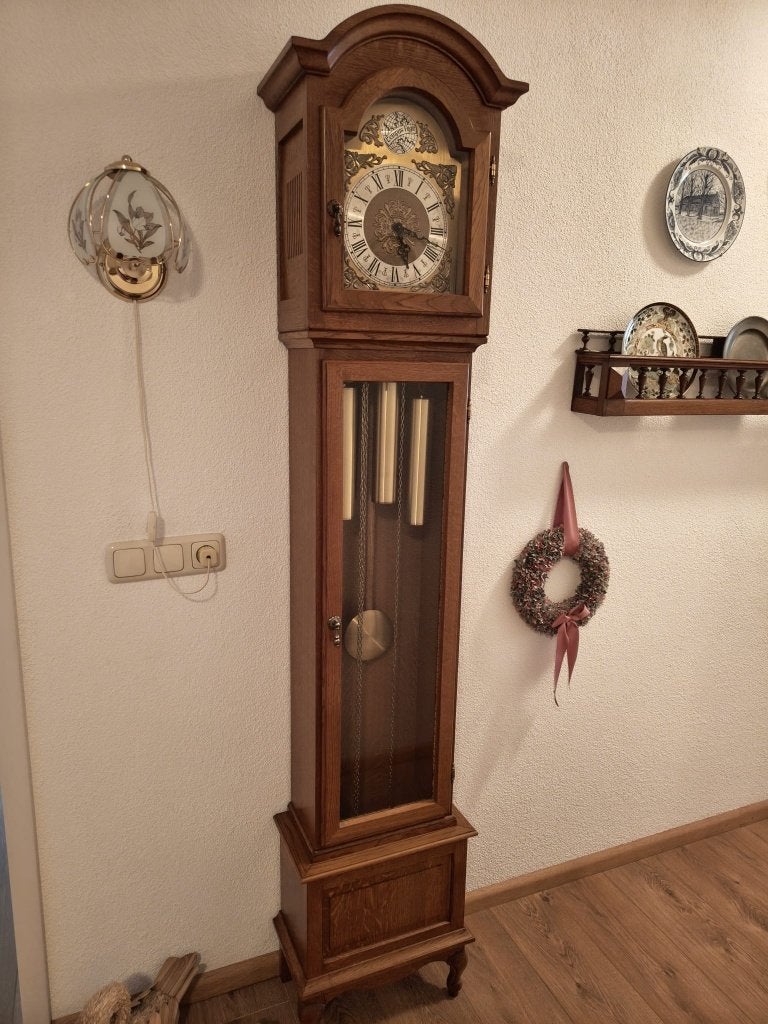 Antieke staande klok, Ophalen