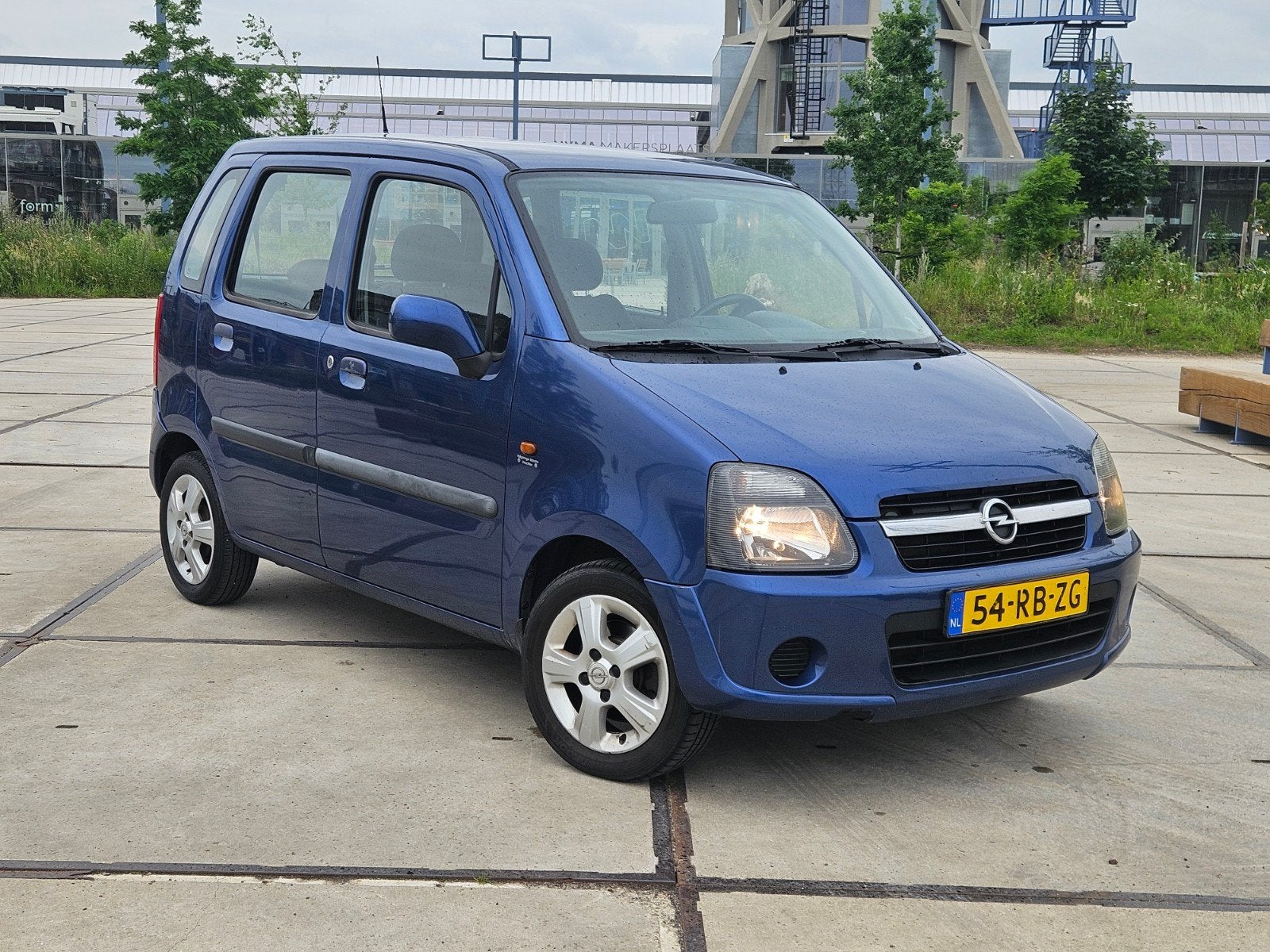 Opel Agila 1.2 16V Twinport 2005 Blauw, Auto's, Opel, Voorwielaandrijving, Stof, 40 €/maand, Zwart