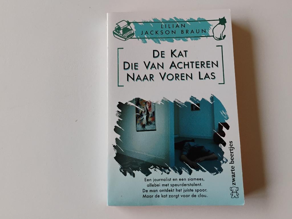 Boek De kat die van achteren naar voren las L. Jackson braun, Ophalen of Verzenden, Gelezen