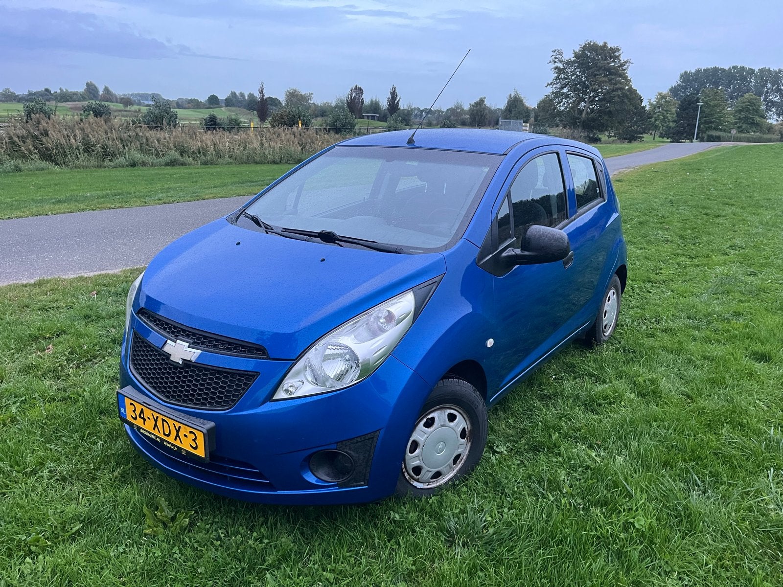Chevrolet Spark 1.0 Bifuel 2012 Blauw, 15 km/l, 37 €/maand, 4 cilinders, Blauw