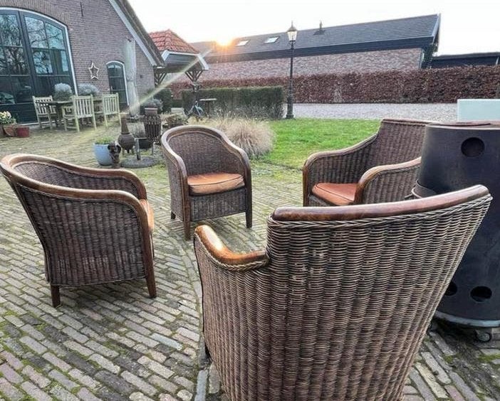 4 Rotan fauteuils met schapenleren kussens, Huis en Inrichting, Fauteuils, Gebruikt, Ophalen of Verzenden, 50 tot 75 cm, Riet of Rotan