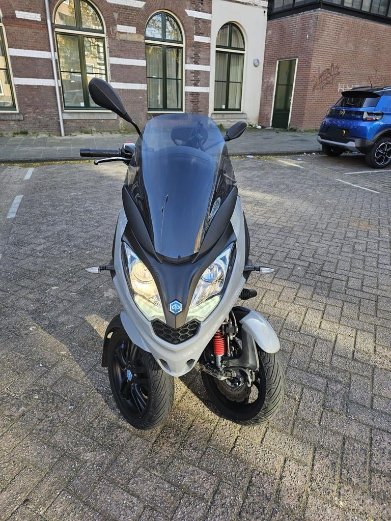 Piaggio MP3 grijs, Fietsen en Brommers, Brommers | Overige merken, Zo goed als nieuw, Ophalen